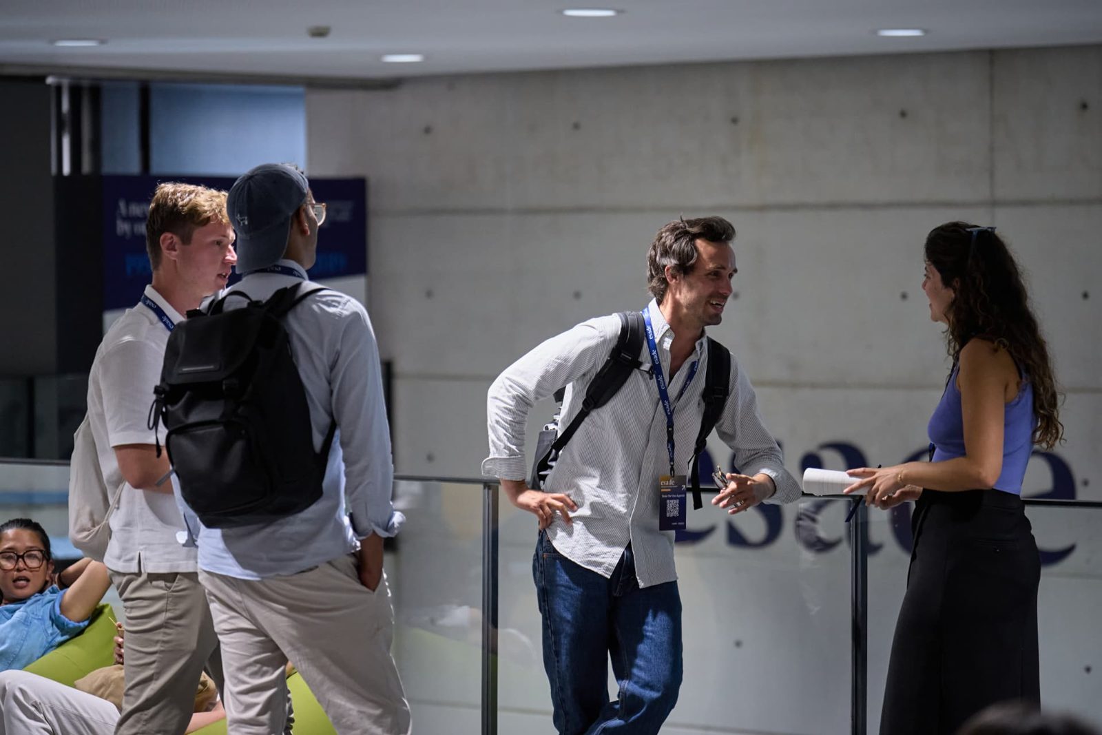 Attendees talking between sessions at Esade